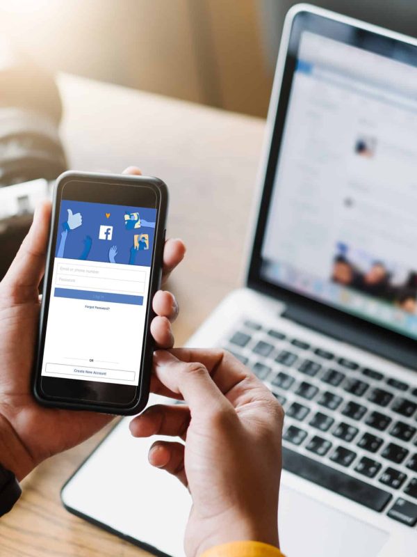 Bangkok. Thailand. March 1,2019 Facebook social media app logo on log-in, sign-up registration page on mobile app screen on iPhone smart devices in business person's hand at work