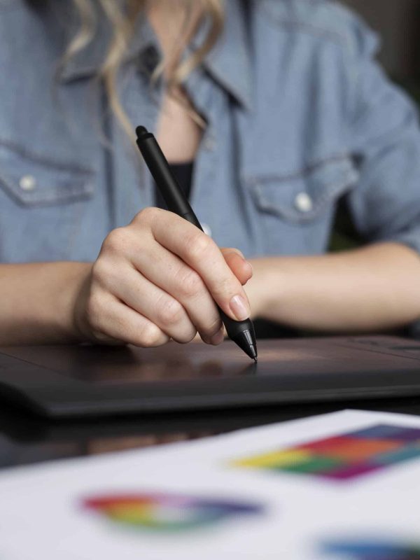 young-female-logo-designer-working-graphic-tablet